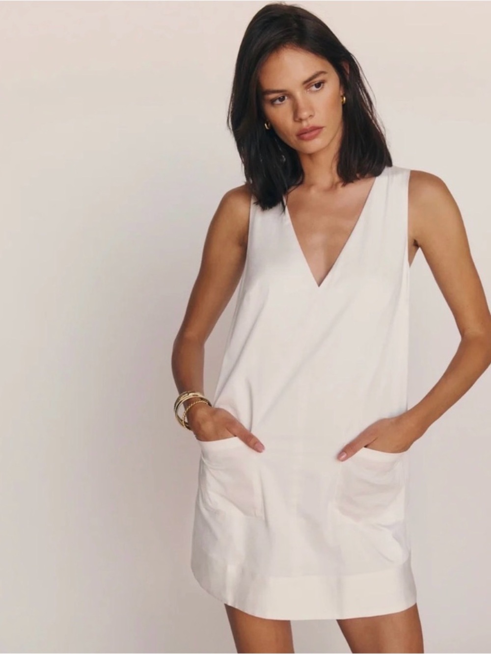 Reformation Sleeveless Mini Dress in White with pockets
